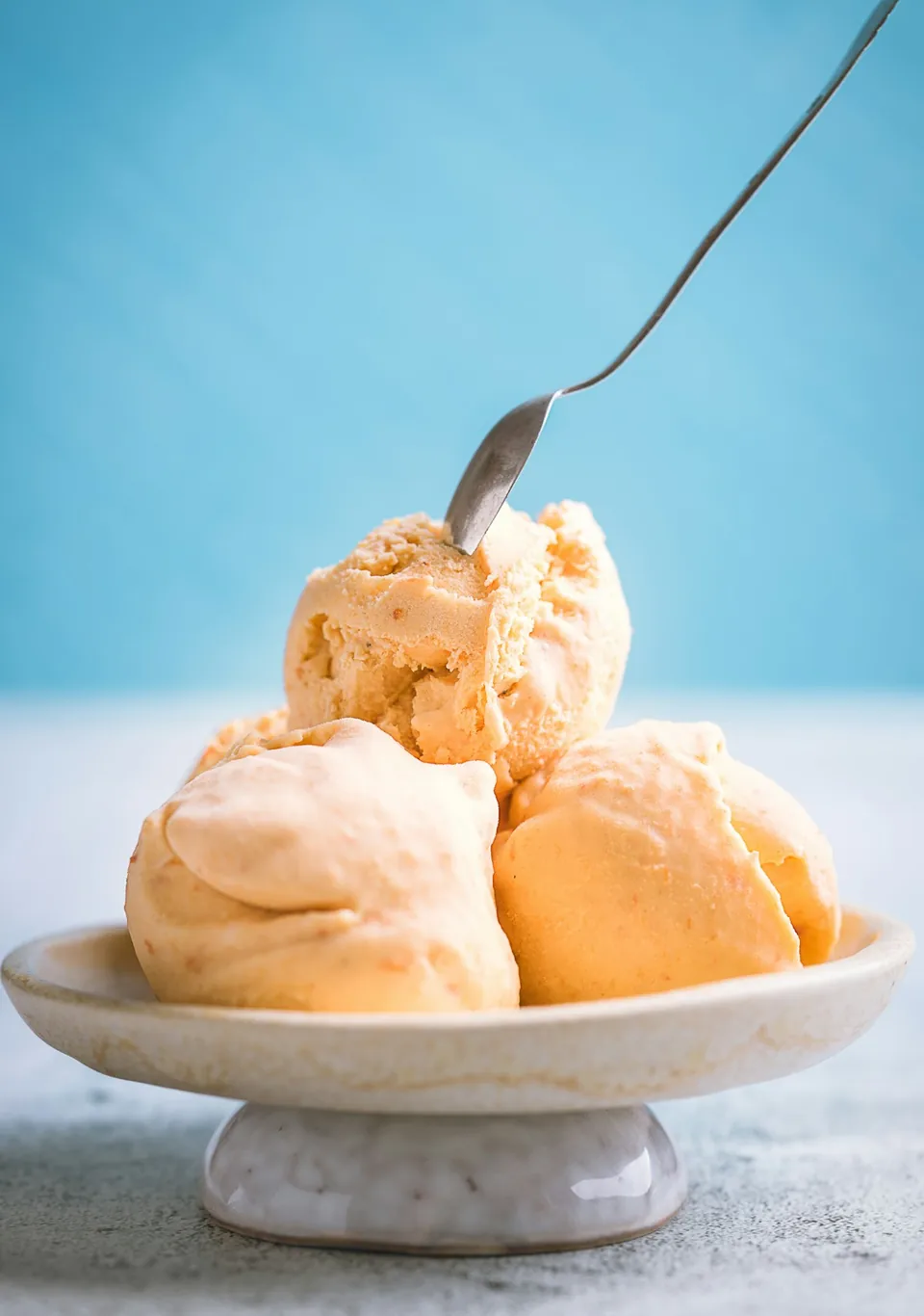 Ice cream in a ceramic bowl, shown as culinary inspiration